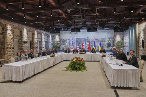 Delegations from U.S, left, led by U.S. Secretary of State Marco Rubio, fourth left, Turkey, center, led by Turkish Foreign Minister Hakan Fidan, center, and Ukraine, right, led by Ukraine's Minister of Foreign Affairs Andrii Sybiha, fourth right, and Ukraine's Defence Minister Rustem Umerov, second right, gather for a meeting at Dolmabahce palace, in Istanbul, Turkey, Friday, May 16, 2025. (AP Photo/Francisco Seco, Pool)