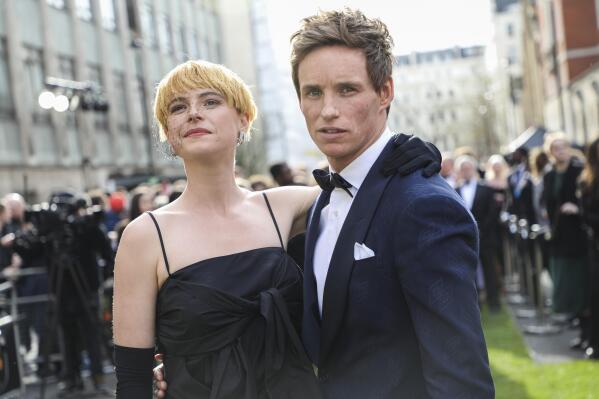 Jessie Buckley, left, and Eddie Redmayne pose for photographers upon arrival at the Olivier Awards in London, Sunday, April 10, 2022. (Photo by Vianney Le Caer/Invision/AP)