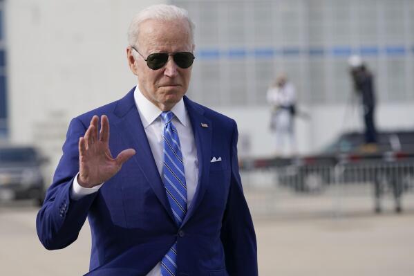 President Joe Biden boards Air Force One at Des Moines International Airport, in Des Moines Iowa, Tuesday, April 12, 2022, en route to Washington. (AP Photo/Carolyn Kaster)