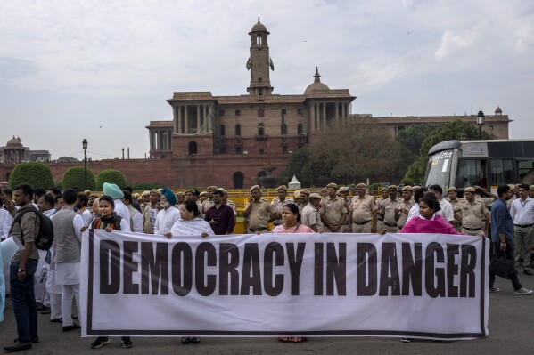 FILE - Lawmakers from India's opposition parties protest against the government of Prime Minister Narendra Modi outside the parliament in New Delhi, India, March 24, 2023. (AP Photo/Altaf Qadri, file)