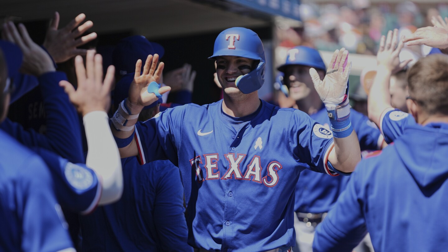 Rangers' Josh Jung hits 2-run homer for mom while facing brother Jace on Mother's Day