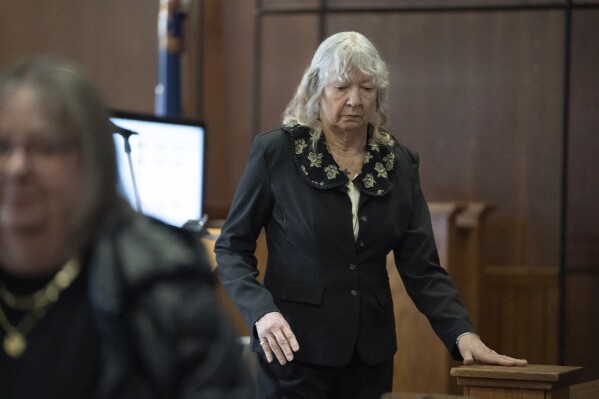 The trial continues for Marshella Chidester, who leaves her court seat during a break in the Monroe County Courthouse courtroom, March 6, 2025, in Monroe, Mich. (Mandi Wright/Detroit Free Press via AP, Pool)
