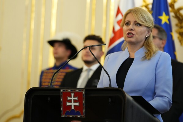FILE - Slovakia's President Zuzana Caputova addresses the newly appointed government during a swear in ceremony at the Presidential Palace in Bratislava, Slovakia, on Oct. 25, 2023. Caputova said on Friday Dec. 8, 2023 she was ready to veto and likely to challenge with the Constitutional Court the new government’s plan to close the special prosecutors office that deals with major crimes, including graft and organized crime. (AP Photo/Petr David Josek, File)