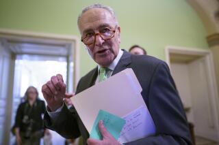 Senate Majority Leader Chuck Schumer, D-N.Y., talks to reporters as he leaves a news conference at the Capitol in Washington, Thursday, July 15, 2021. Schumer is scheduling a procedural vote for next Wednesday to begin debate on a still-evolving bipartisan infrastructure bill. (AP Photo/J. Scott Applewhite)