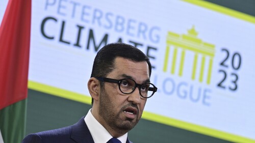 FILE - The Minister of Industry and Advanced Technology in the United Arab Emirates (UAE) and COP28 UAE President-Designate, Sultan Ahmed al-Jaber, attends a joint press conference on the second day of the Petersberg Climate Dialogue in Berlin, Germany, on May 3, 2023. The president of this years United Nations' climate talks has urged the oil and gas industry to reach net zero greenhouse gas emissions by or before 2050 at a speech Thursday, July 6, 2023, to oil producing states. (John MacDougall/Pool Photo via AP, File)