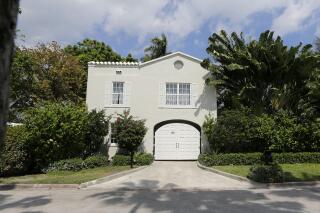 The gate house entrance of the waterfront mansion once owned by gangster Al Capone in Miami Beach, Fla., Wednesday, March 18, 2015. The South Florida house that Capone owned for nearly two decades, and died in, is facing demolition plans. The Miami Herald reported Thursday, Sept. 2, 2021 that the new owners of the nine-bedroom, Miami Beach house plan to demolish it after buying it for $10.75 million this summer. (AP Photo/Alan Diaz)