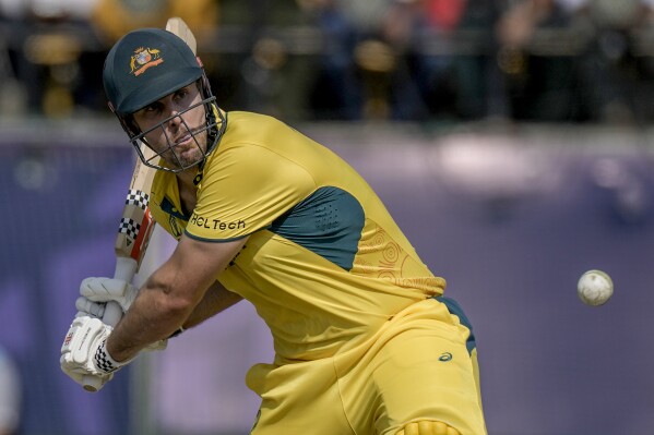 Australia's Mitchell Marsh plays a shot during the ICC Men's Cricket World Cup match between Australia and New Zealand in Dharamshala, India,Saturday, Oct. 28, 2023. (AP Photo/Ashwini Bhatia)