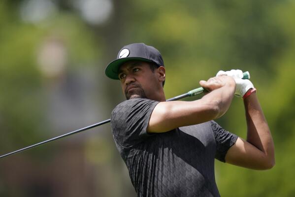 Tony Finau drives off the second tee during the third round of the Rocket Mortgage Classic golf tournament, Saturday, July 30, 2022, in Detroit. (AP Photo/Carlos Osorio)