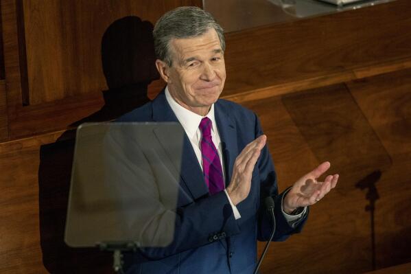 North Carolina Gov. Roy Cooper delivers his State of the State address to a joint session of the N.C. General Assembly on Monday, March 6, 2023, in Raleigh, N.C. (Travis Long/The News & Observer via AP)