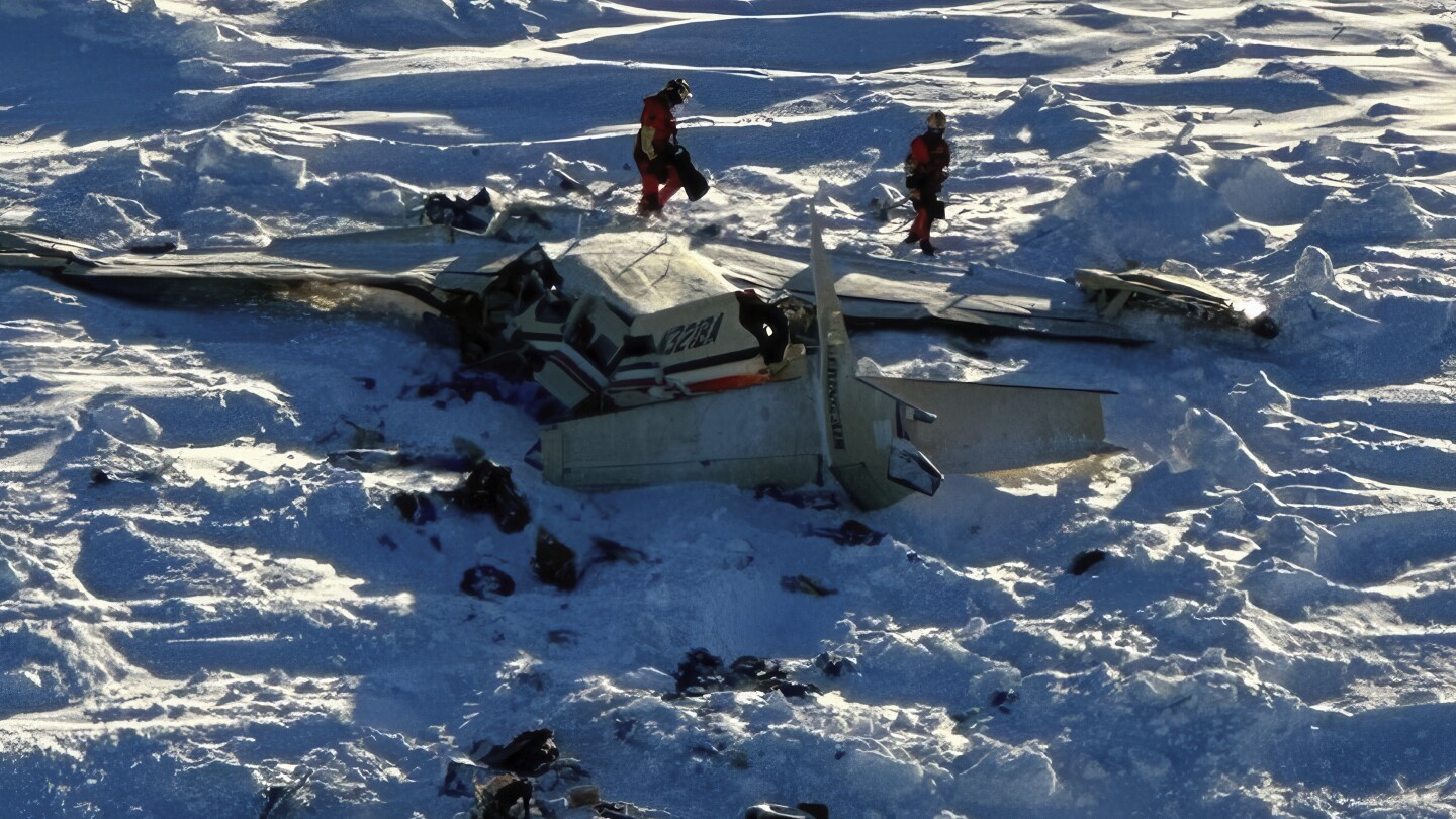 US investigators say Alaska plane was overweight for icy conditions in crash that killed 10