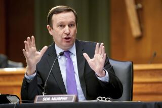 FILE - Sen. Chris Murphy, D-Conn., speaks during a Senate Health, Education, Labor, and Pensions hearing on Capital Hill in Washington, in this Tuesday, May 11, 2021, file photo. College athletes would have the right to organize and collectively bargain with schools and conferences under a bill introduced Thursday, May 27, by Democratic lawmakers in the House and Senate.  Sen. Chris Murphy (Conn.) and Sen. Bernie Sanders (Vt.)  announced the College Athletes Right to Organize Act. (Jim Lo Scalzo/Pool via AP, File)