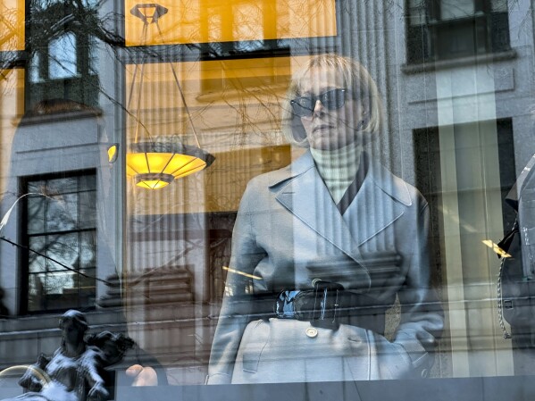 E. Jean Carroll arrives at Manhattan federal court, Wednesday, Jan. 17, 2024, in New York. Less than a year after convincing a jury that former President Donald Trump sexually abused her decades ago, writer E. Jean Carroll is set to take the stand again to describe how his verbal attacks affected her after she came forward. (AP Photo/Ted Shaffrey)