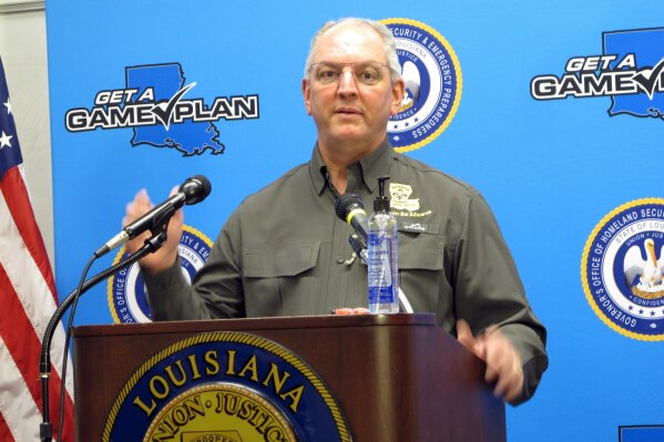 Louisiana Gov. John Bel Edwards talks about the expected impact of Hurricane Laura, Tuesday, Aug. 25, 2020, in Baton Rouge, La. (AP Photo/Melinda Deslatte)