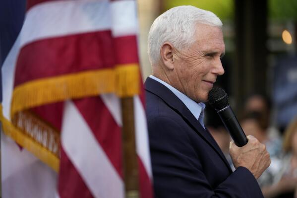 Former Vice President Mike Pence speaks to local residents during a meet and greet, Tuesday, May 23, 2023, in Des Moines, Iowa. (AP Photo/Charlie Neibergall)