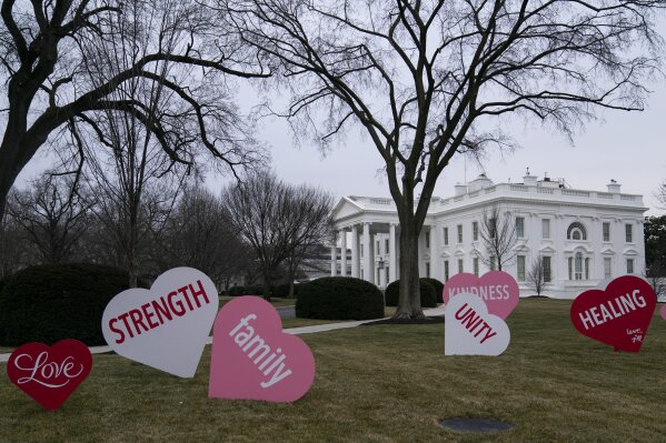 Decorations sit on the North Lawn of the White House, Friday, Feb. 12, 2021, in Washington. (AP Photo/Evan Vucci)