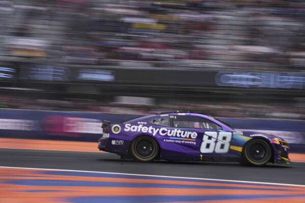 Shane Van Gisbergen drives during a NASCAR Cup Series auto race at Hermanos Rodríguez race track in Mexico City, Sunday, June 15, 2025. (AP Photo/Fernando Llano)