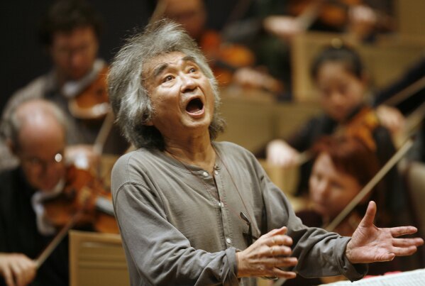 FILE - Former Director of the Boston Symphony Orchestra Seiji Ozawa conducts the orchestra during a rehearsal of Berlioz's "Symphonie Fantastique," at Symphony Hall, in Boston, on Nov. 26, 2008. World-renowned conductor Ozawa has died of heart failure at his home in Tokyo, his management office said Friday, Feb. 9, 2024. He was 88. (AP Photo/Steven Senne, File)