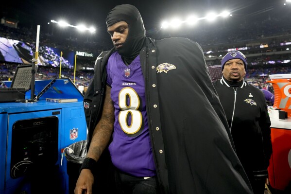 Baltimore Ravens quarterback Lamar Jackson (8) leaves the field after an AFC Championship NFL football game against the Kansas City Chiefs, Sunday, Jan. 28, 2024, in Baltimore. The Kansas City Chiefs won 17-10. (AP Photo/Alex Brandon)