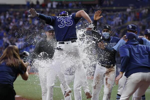 Phillips homers in 10th as Rays rally to beat Tigers 7-4