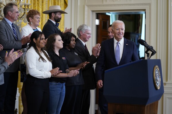 President Joe Biden arrives to speak on the anniversary of the Inflation Reduction Act during an event in the East Room of the White House, Wednesday, Aug. 16, 2023, in Washington. (AP Photo/Evan Vucci)