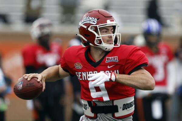 National quarterback Jake Haener of Fresno State throws a pass during practice for the Senior Bowl NCAA college football game Thursday, Feb. 2, 2023, in Mobile, Ala.. (AP Photo/Butch Dill)