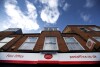 FILE - A Royal Mail Post Office is seen in London, Thursday, Oct. 10, 2013. U.K. police have opened a fraud investigation into Britain’s Post Office over a miscarriage of justice that saw hundreds of postmasters wrongfully accused of stealing money, when a faulty computer system was to blame. The Metropolitan Police said late Friday, Jan. 5, 2024, that it was investigating “potential fraud offences arising out of these prosecutions,” relating to money the Post Office received “as a result of prosecutions or civil actions” against falsely accused postal workers. (AP Photo/Lefteris Pitarakis, File)