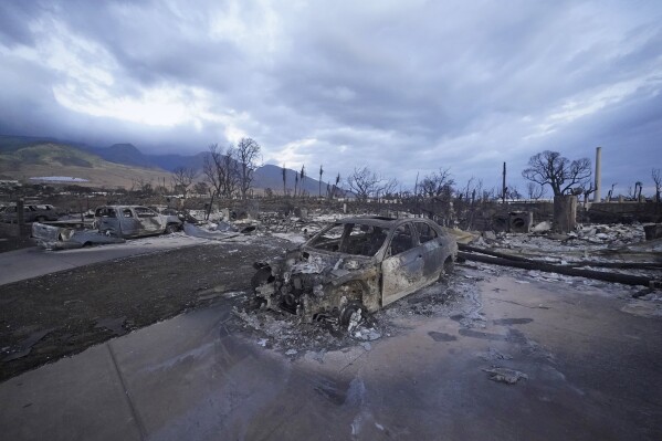 Wildfire wreckage is shown Thursday, Aug. 10, 2023, in Lahaina, Hawaii. (AP Photo/Rick Bowmer)