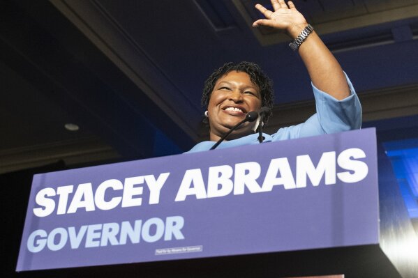 
              FILE - In this Tuesday, Nov. 6, 2018 file photo, Georgia Democratic gubernatorial candidate Stacey Abrams speaks to supporters during an election night watch party in Atlanta. On Tuesday, Nov. 13, 2018, The Associated Press has found that stories circulating on the internet that U.S. District Judge Leslie Abrams, sister of the gubernatorial hopeful, presided over a complaint related to the too-close-to-call governor’s race, are untrue. (AP Photo/John Amis)
            