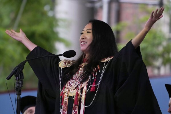Yurong "Luanna" Jiang addresses classmates during commencement ceremonies at Harvard University, Thursday, May 29, 2025, in Cambridge, Mass. (AP Photo/Charles Krupa)