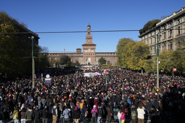 Demonstrators gather on the occasion of International Day for the Elimination of Violence against Women, in Milan, Italy, Saturday, Nov.25, 2023. Thousands of people are expected to take the streets in Rome and other major Italian cities as part of what organizers call a "revolution" under way in Italians' approach to violence against women, a few days after the horrifying killing of a college student allegedly by her resentful ex-boyfriend sparked an outcry over the country's "patriarchal" culture. (AP Photo/Luca Bruno)