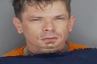 This photo provided by Summit County Sheriff Office shows Jason Conrad. Authorities on Wednesday, May 31, 2023, say Conrad, a county jail inmate who ran away from an officer who had driven him to a hospital for a doctor’s appointment has been captured, ( Summit County Sheriff Office via AP)
