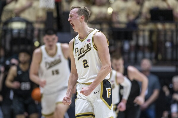 Purdue guard Fletcher Loyer (2) reacts after scoring against Michigan State during the first half of an NCAA college basketball game Saturday, March 2, 2024, in West Lafayette, Ind. (AP Photo/Doug McSchooler)