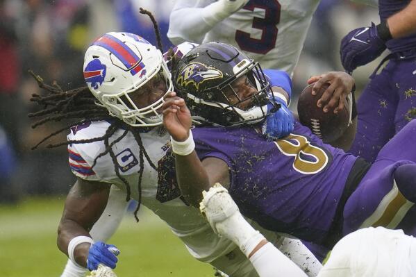Ravens' Harbaugh stands by 4th-down call in loss to Bills