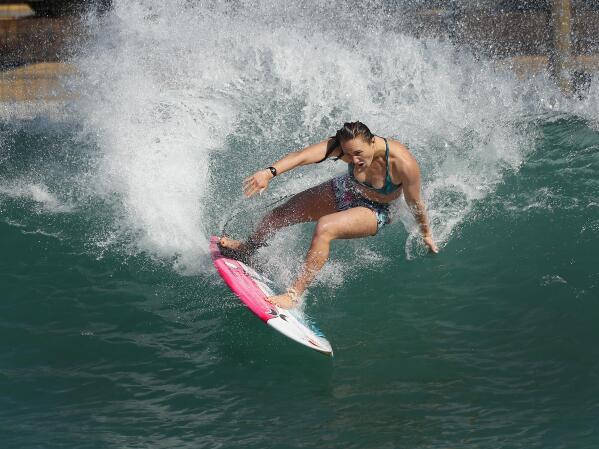 Female surfers overcome sexism's toll to earn Olympic berth