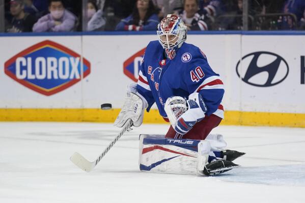 New York Rangers goaltender Alexandar Georgiev makes a save during the second period of the NHL hockey game against the Buffalo Sabres, Sunday, March 27, 2022, in New York. (AP Photo/Seth Wenig)