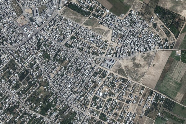 This image provided by Maxar Technologies shows before bombing at the Beit Hanoun neighborhood, northern Gaza, May 1, 2023. (Satellite image ©2023 Maxar Technologies via AP)