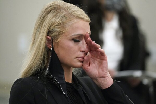 Paris Hilton says she was abused as teen at Utah school | AP News