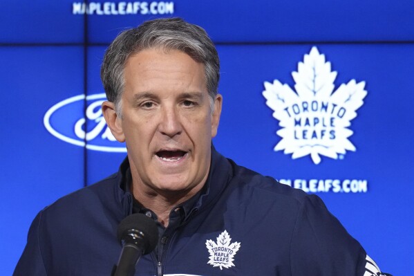 Brendan Shanahan, president and alternate governor for the Toronto Maple Leafs, speaks to the media during a press conference at the start of the NHL hockey team's training camp in Toronto, Wednesday, Sept. 18, 2024. (Nathan Denette/The Canadian Press via AP, File)
