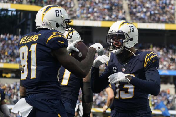 Los Angeles Chargers wide receiver Keenan Allen (13) celebrates his  touchdown against the Arizona Cardinals during the first half of an NFL  football game, Sunday, Nov. 27, 2022, in Glendale, Ariz. (AP