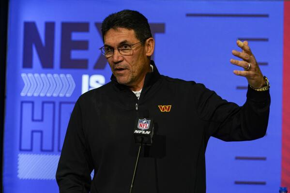 Washington Commanders head coach Ron Rivera speaks during a press conference at the NFL football scouting combine in Indianapolis, Tuesday, March 1, 2022. (AP Photo/Michael Conroy)