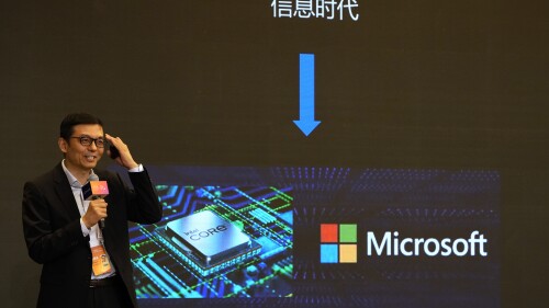 A presenter talks about Microsoft in the Information Age during the World Artificial Intelligence Conference in Shanghai, Thursday, July 6, 2023. A China-based hacking group has breached email accounts linked to government agencies in Western Europe, Microsoft Corp. said in a blog post published Tuesday, July 11. (AP Photo/Ng Han Guan)