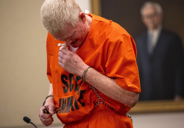 Alex Murdaugh cries as he addresses the court during his sentencing for stealing from 18 clients, Nov. 28, 2023, at the Beaufort County Courthouse in Beaufort, S.C. Murdaugh is scheduled to be sentenced Monday, April 1, 2024 on financial crime charges. It's likely the last time he will face a judge for punishment. (Andrew J. Whitaker/The Post And Courier via AP, Pool, file)