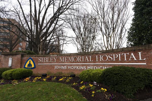 Sibley Memorial Hospital in Washington, Wednesday, March 23, 2022. The Supreme Court is declining to say whether 73-year-old Justice Clarence Thomas remains in the hospital. He had been expected to be released by Tuesday evening. Thomas was admitted to Sibley Memorial Hospital in Washington on Friday after experiencing “flu-like symptoms,” and diagnosed with an infection.  (AP Photo/Manuel Balce Ceneta)