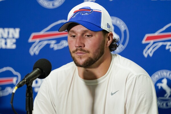 Buffalo Bills quarterback Josh Allen answers questions during an interview after the Bills lost to the New York Jets 22-16 in overtime of an NFL football game, Monday, Sept. 11, 2023, in East Rutherford, N.J. (AP Photo/Seth Wenig)
