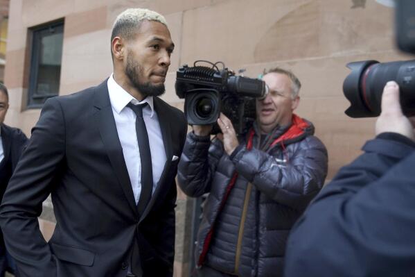Newcastle United footballer Joelinton arrives at Newcastle Upon Tyne Magistrates' Court, where he is charged with drink driving, in Newcastle, England, Thursday, Jan. 26, 2023. The 26-year-old Brazilian was arrested after Northumbria Police pulled over a vehicle in Newcastle early on Jan. 12. (Owen Humphreys/PA via AP)