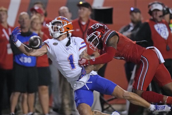 Utah cornerback JaTravis Broughton, right, defends against Florida wide receiver Ricky Pearsall (1) on an incomplete pass during the second half of an NCAA college football game Thursday, Aug. 31, 2023, in Salt Lake City. (AP Photo/Rick Bowmer)
