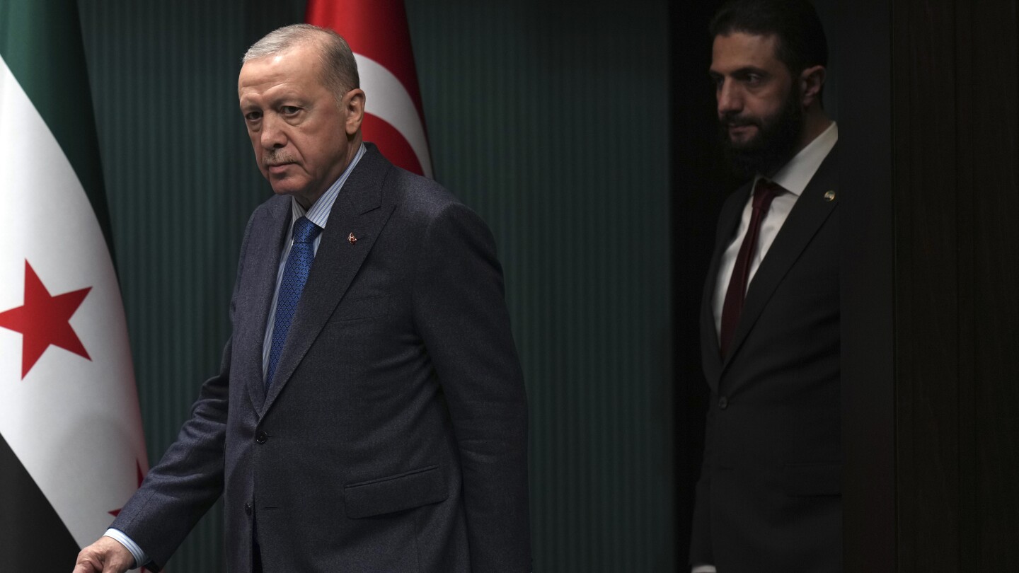 Syria's interim leader holds talks with key ally Turkey on his second international trip