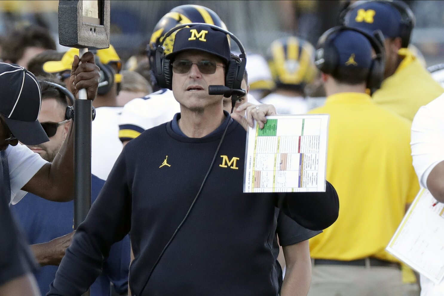 Jim Harbaugh almost left for NFL. What brought him back to Michigan?