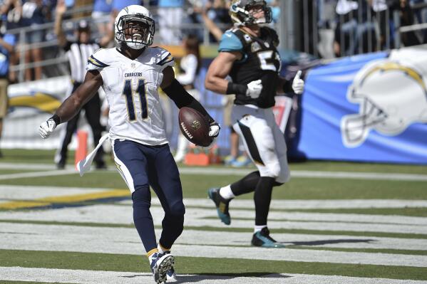San Diego Chargers wide receiver Eddie Royal celebrates his 43-yard touchdown reception against the Jacksonville Jaguars during the first half of an NFL football game Sunday, Sept. 28, 2014, in San Diego.  (AP Photo/Denis Poroy)