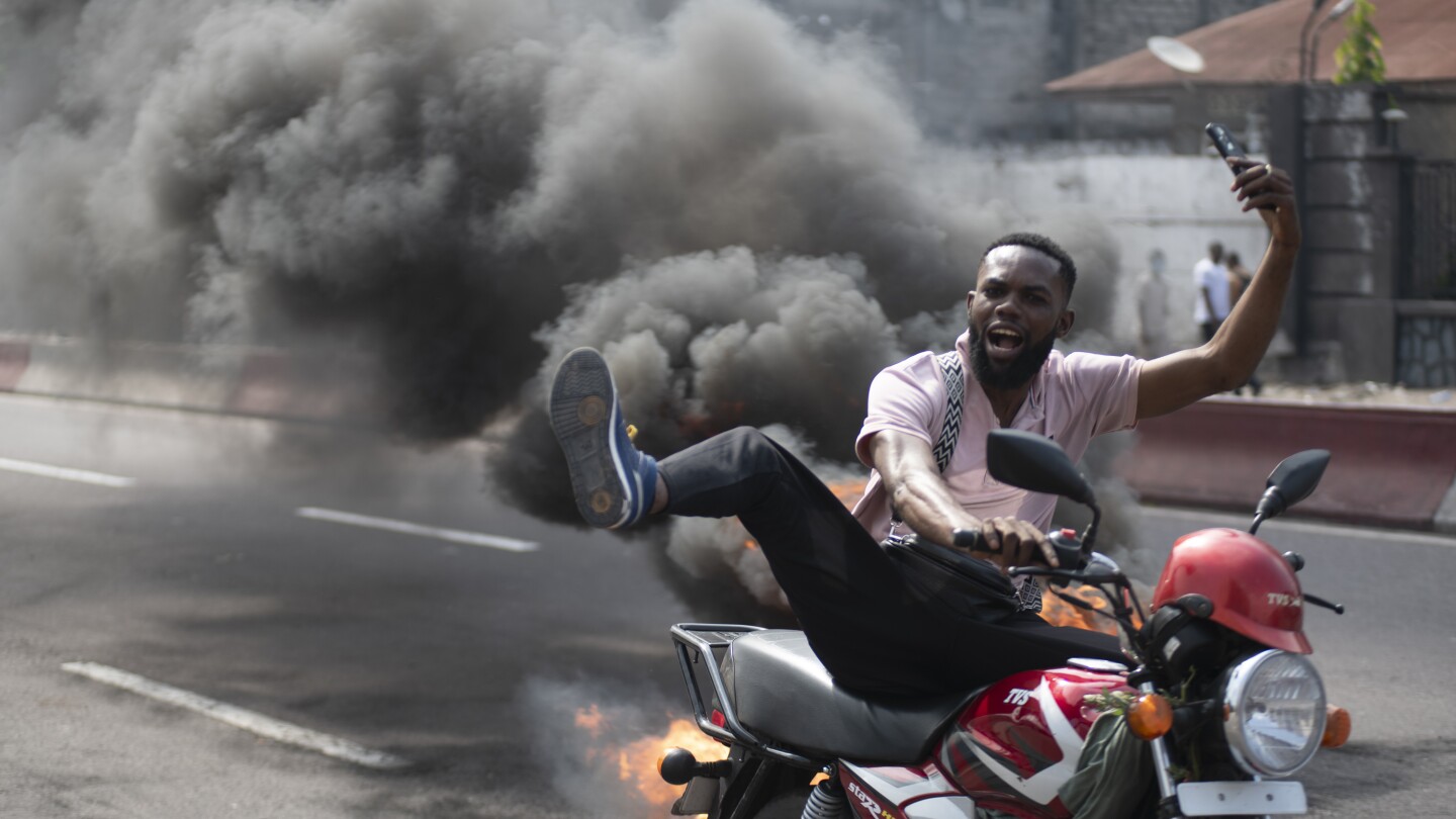 Protesters assault embassies in Congo’s capital as safety forces attempt to sluggish rebels within the east